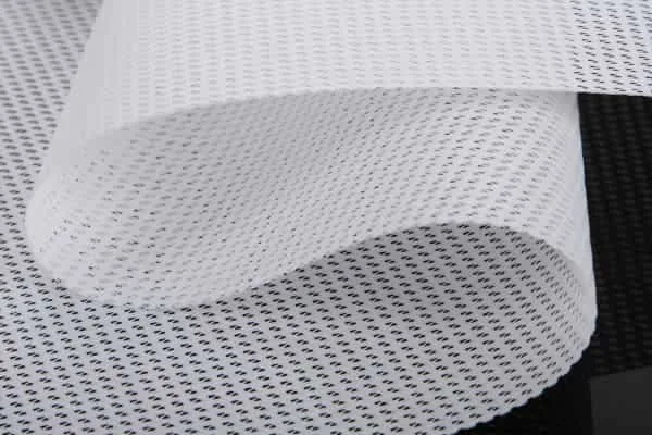 Close-up of open white PVC mesh banner material